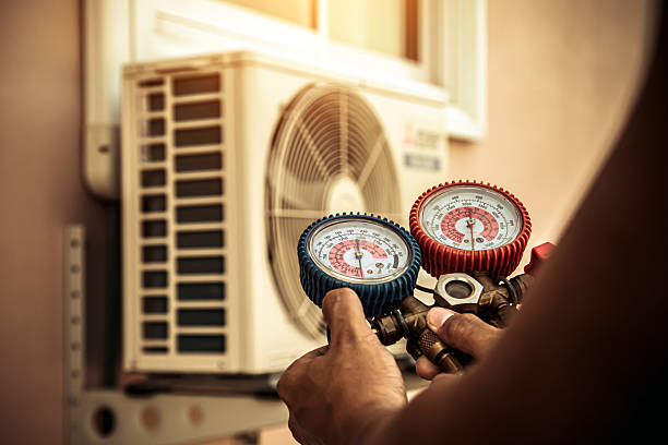 Professional Hvac technician working in Shannon, MS